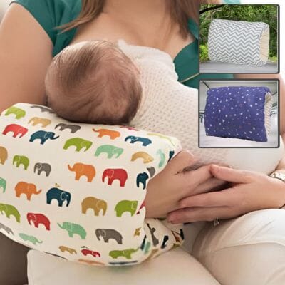 Coussin-d-allaitement-bébé-est-dans-le-bras-de-sa-maman