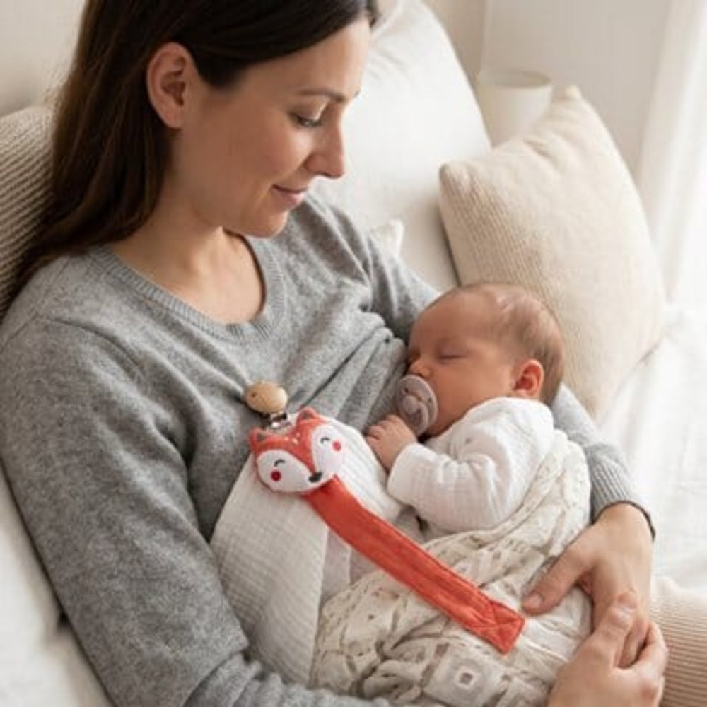 Attache tetine fixation solide