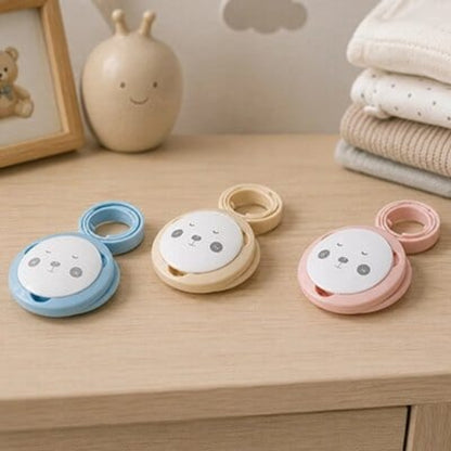 Attache tetine motif rond avec visage