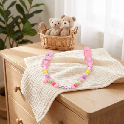 Attache tetine securite et tendance rose