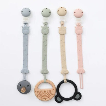 Attache tetine silicone coloris doux et modernes