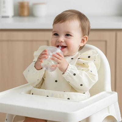 Bavoir manche longue confiance en soi à table