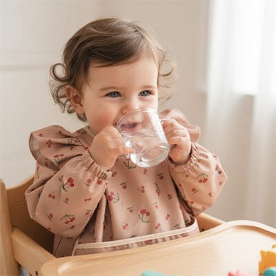 Bavoir manche longue design