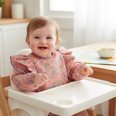 Bavoir manche longue motifs joyeux et colorés