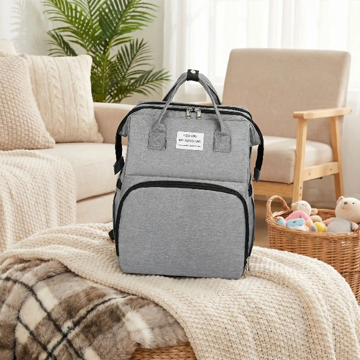 Sac a dos a langer mom's-bag gris
